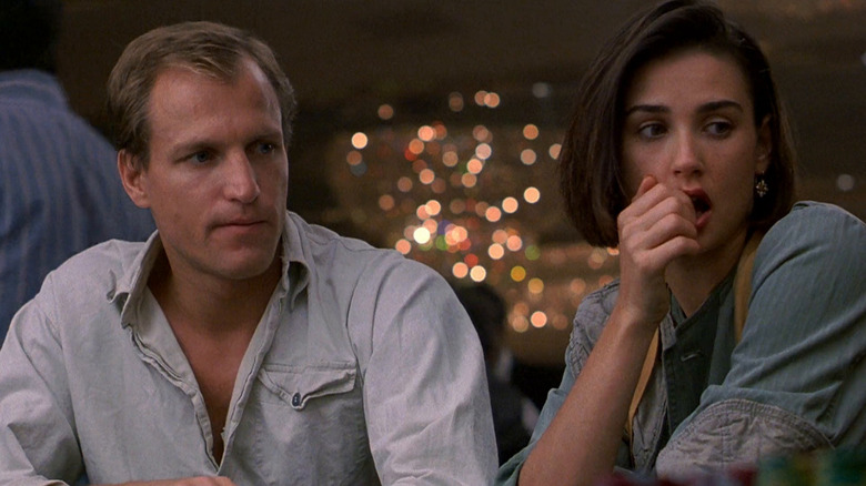 David (Woody Harrelson) and Diana Murphy (Demi Moore) sit shocked at a casino table in Indecent Proposal