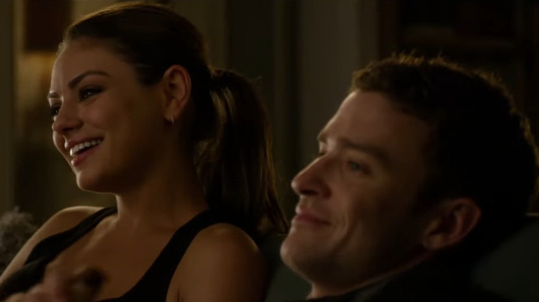 Jamie (Mila Kunis) laughing with Dylan (Justin Timberlake) in Friends With Benefits