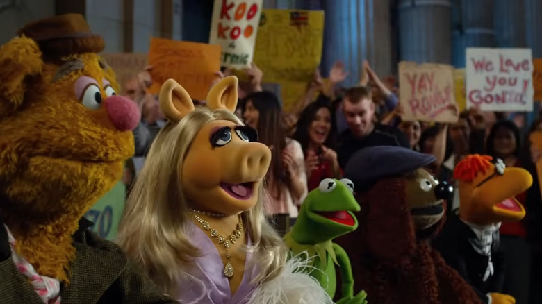 The Muppets staring at their fans in The Muppets (2011)