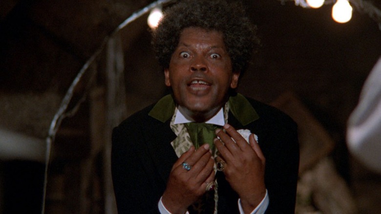 Mr. Simms (Clarence Williams III) tells a terrifying story in Tales From the Hood