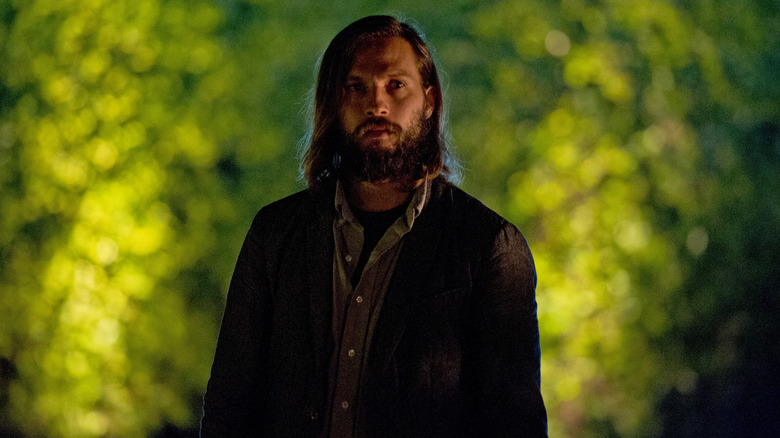 Will (Logan Marshall-Green) reckons with a deeply troubling dinner party in The Invitation