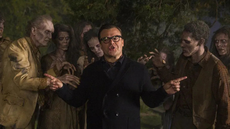 R.L. Stine (Jack Black) surrounded by zombies in Goosebumps