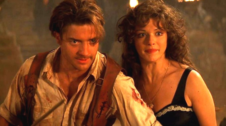 Rick (Brendan Fraser) and Evie (Rachel Weisz) staring ahead in The Mummy