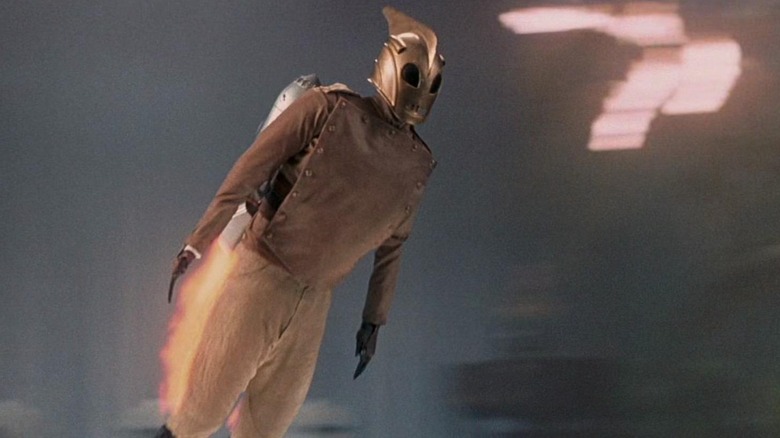 The Rocketeer (Billy Campbell) flying through the sky in The Rocketeer