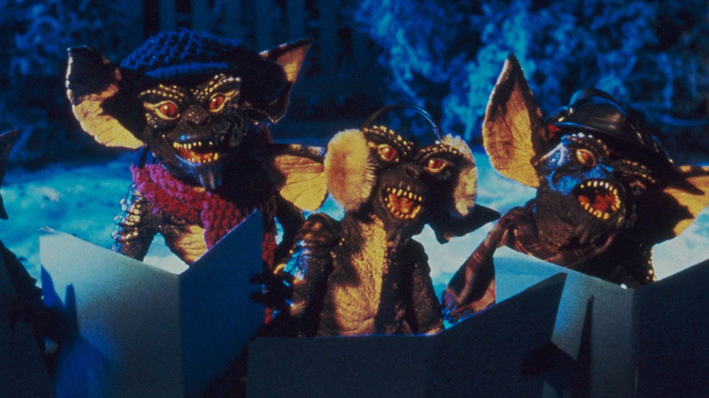 A group of Gremlins sings Christmas Carols in Gremlins