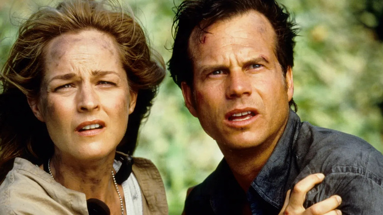 Helen Hunt as Jo embraces Bill Paxton as Bill in Twister