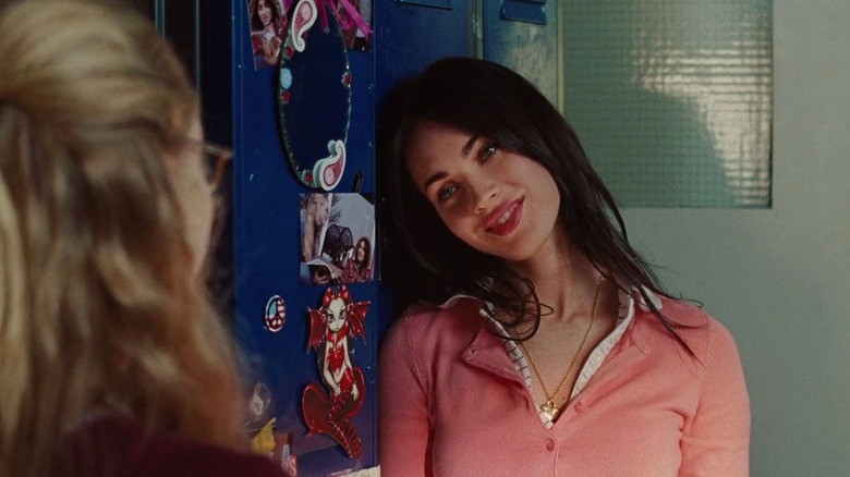 Megan Fox as Jennifer smiling at Amanda Seyfried as Needy in Jennifer's Body