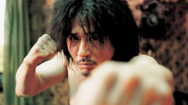 Oh Dae-su (Choi Min-sik) practices boxing in Oldboy (2003)