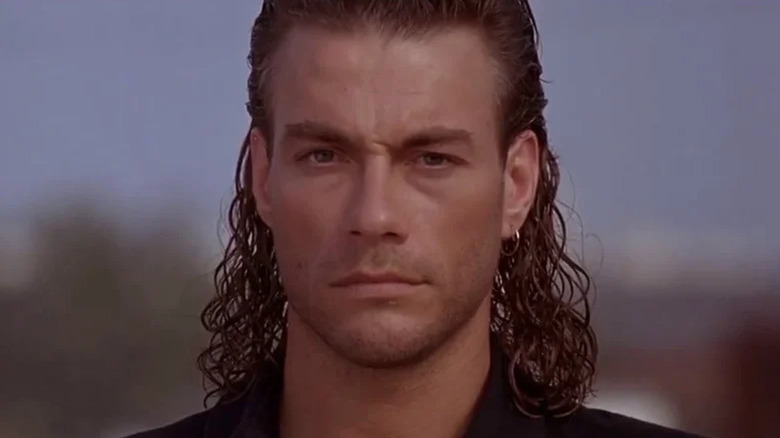 Chance Boudreaux (Jean-Claude Van Damme) stares grimly ahead in Hard Target