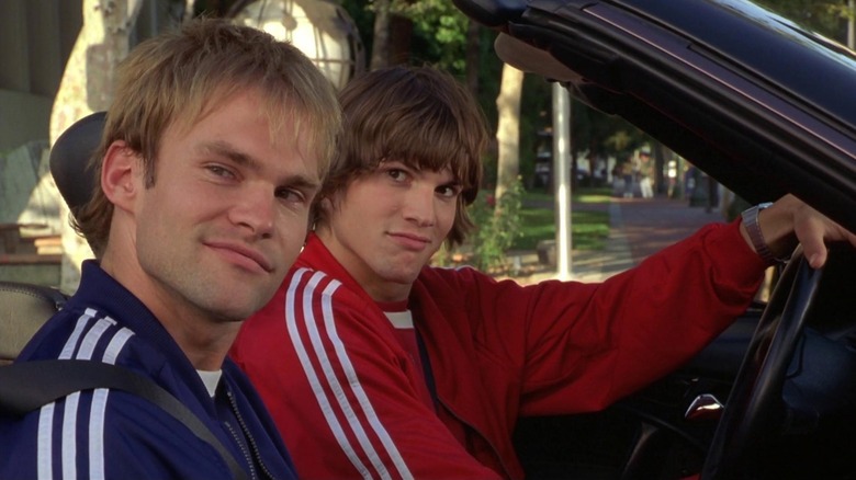 Chester (Seann William Scott) and Jesse (Ashton Kutcher) smirk in a convertible in Dude, Where's My Car?