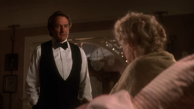 Peter Pan (Robin Williams) talking to an old woman in Hook