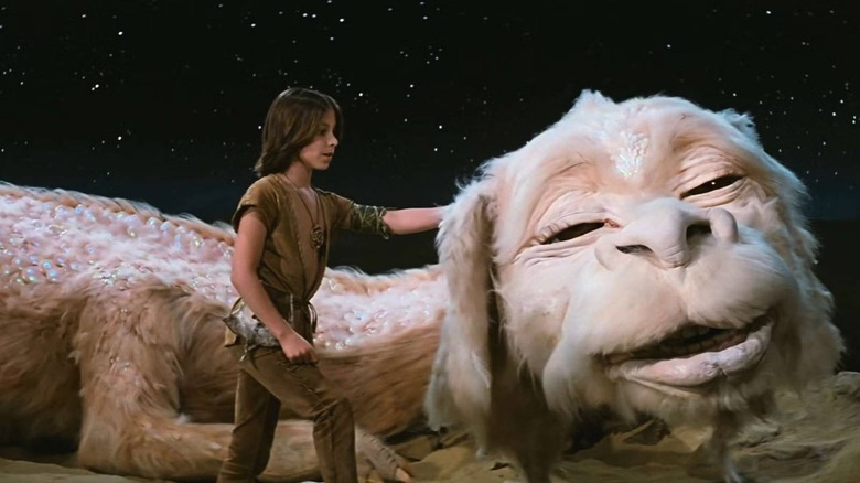 Atreyu (Noah Hathaway) petting Falkor in The NeverEnding Story
