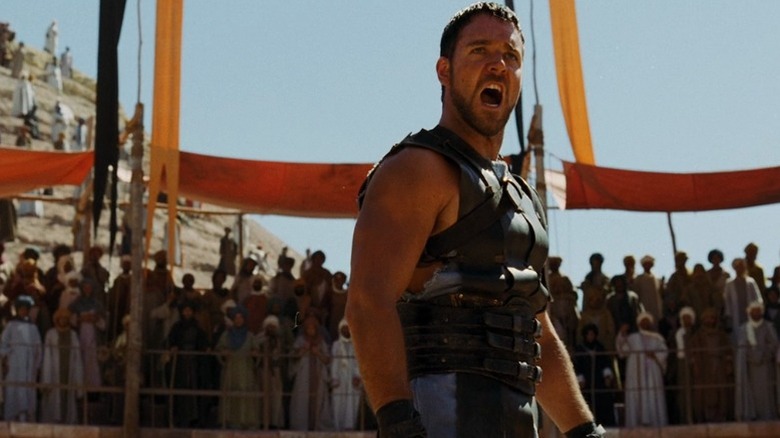 Russell Crowe as Maximus shouts at an arena crowd in Gladiator