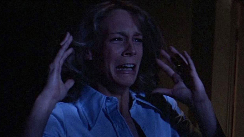 Jamie Lee Curtis as Laurie Strode, terrified in Halloween