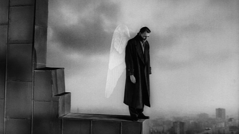 Damiel (Bruno Ganz) looking down on Berlin in Wings of Desire