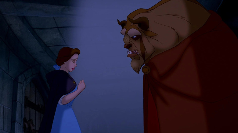 Belle (Paige O'Hara) speaks to the Beast (Robby Benson) in Beauty & The Beast