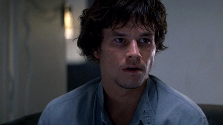 Dirk Diggler (Mark Wahlberg) looking worried in Boogie Nights