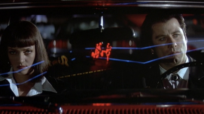 Mia (Uma Thurman) and Vincent (John Travolta) go driving in Pulp Fiction