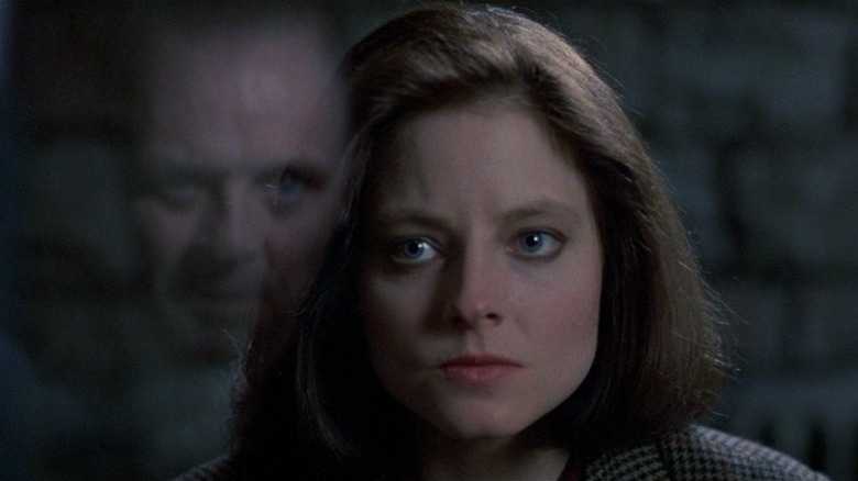 Hannibal Lecter (Anthony Hopkins) talks to Clarice Starling (Jodie Foster) in The Silence of the Lambs