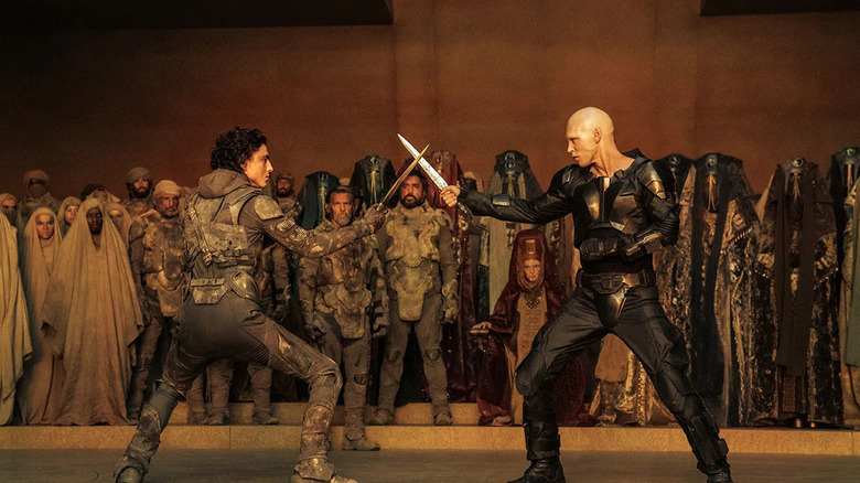 Timothée Chalamet as Paul Atreides and Austin Butler as Feyd-Rautha, dueling in Dune: Part Two.