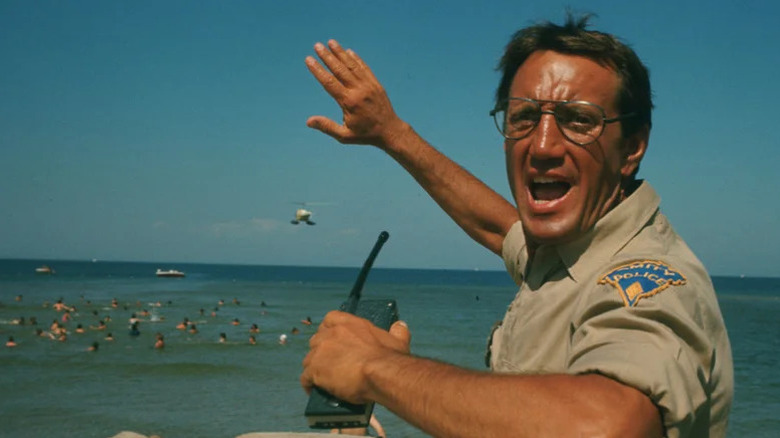 Martin Brody (Roy Scheider) yell while surveying a beach in Jaws