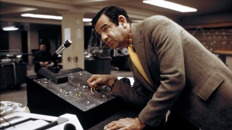 Zachary Garber (Walter Matthau) speaks into a console in Taking of Pelham One Two Three (1974)