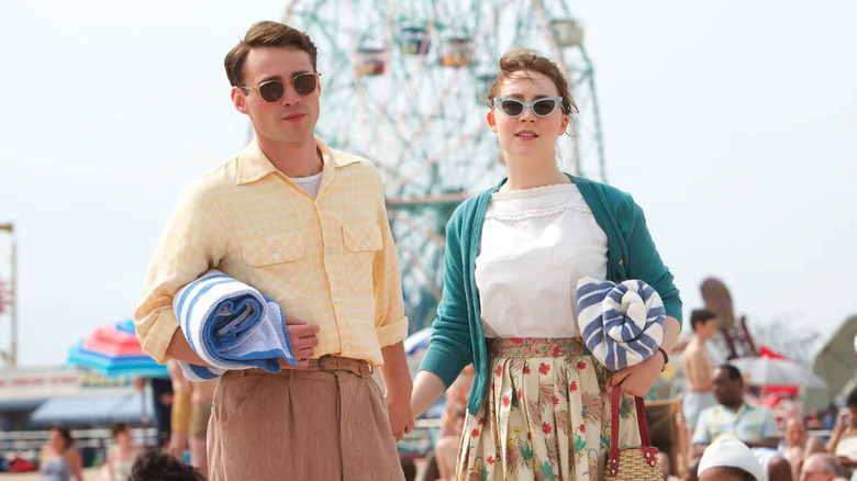 Saoirse Ronan and Emory Cohen as Eilis and Tony on the beach at Coney Island in Brooklyn