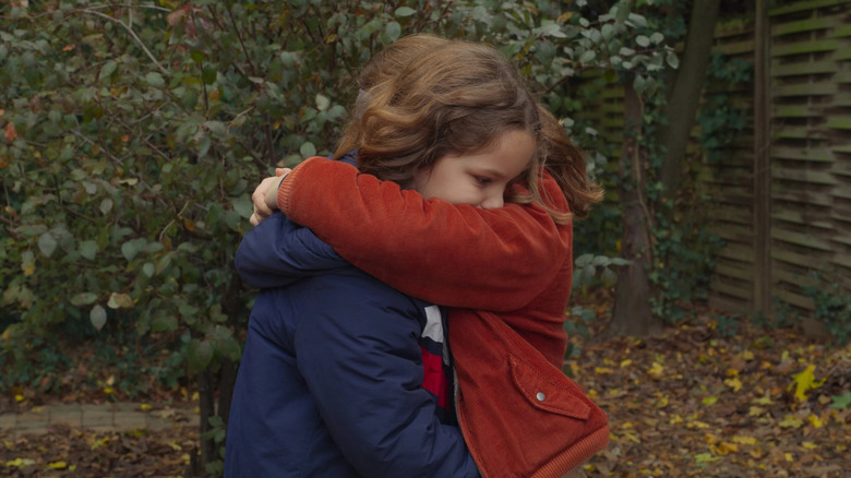 Joséphine and Gabrielle Sanz as Nelly and Marion, embracing in Petite Maman.