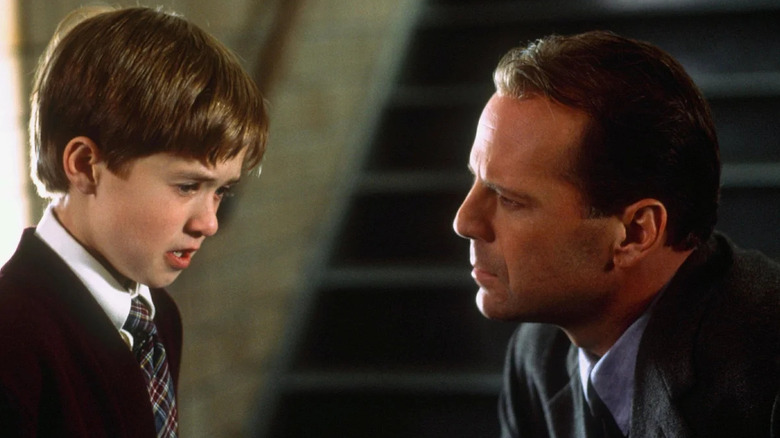 Haley Joel Osment and Bruce Willis as Cole and Malcolm speaking to each other in The Sixth Sense