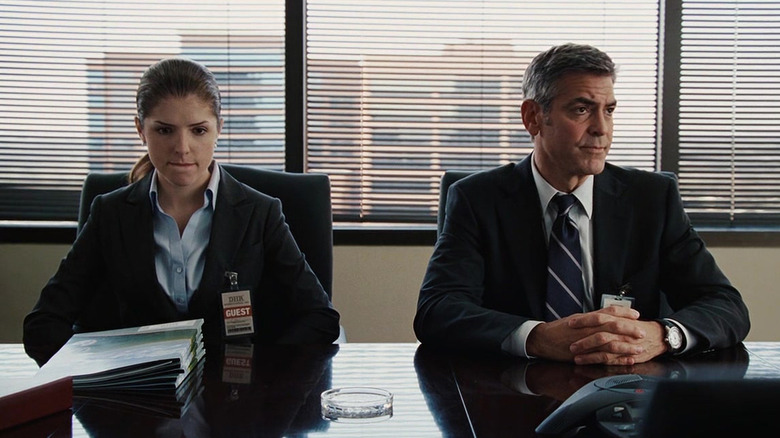 Anna Kendrick and George Clooney as Ryan Bingham and Natalie Keener at a meeting in Up In the Air