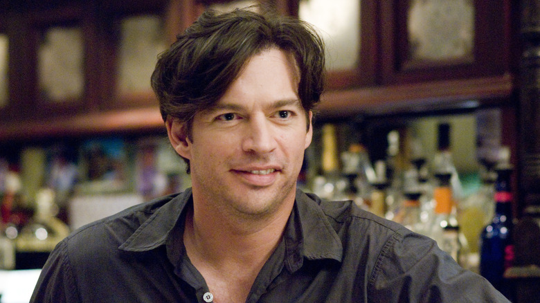 Harry Connick Jr. as Daniel Connelly in a bar in P.S. I Love You