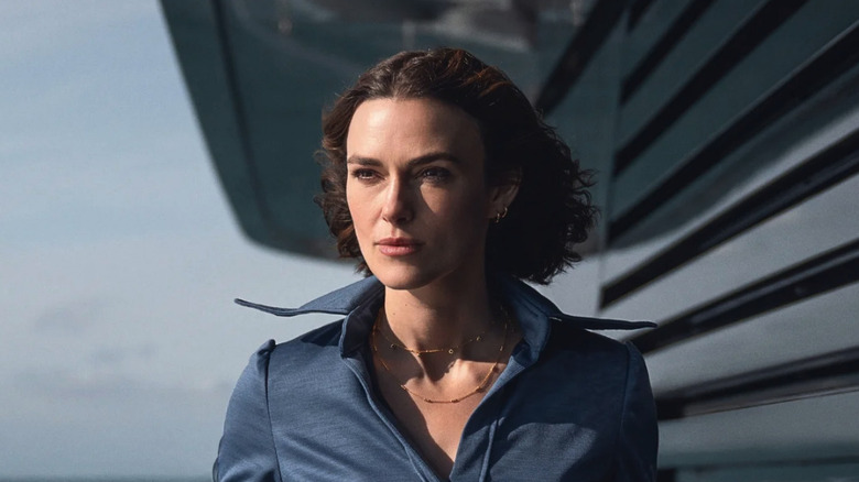 Keira Knightly as Laura, staring into the wind in The Woman in Cabin 10