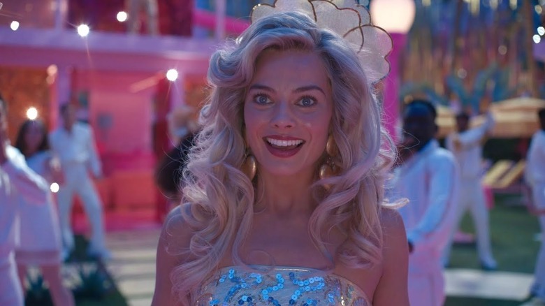 Margot Robbie as Barbie smiling in Barbie