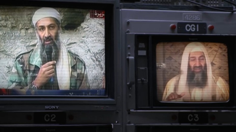 Two televisions displaying videos of Osama bin Laden, from American Manhunt: Osama bin Laden