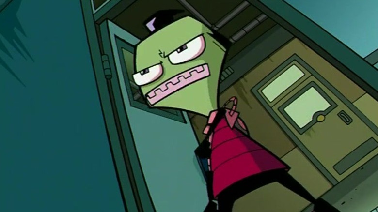 Zim in his human disguise standing under a door frame and smiling haughtily on Invader Zim