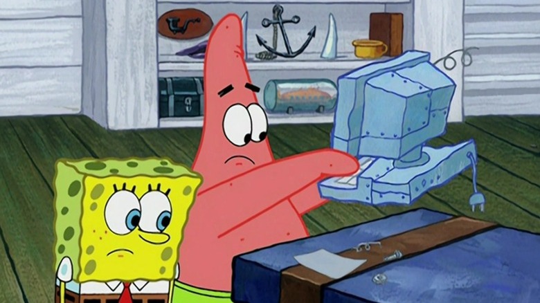 SpongeBob and Patrick looking at a piece of painted paper while Patrick holds a computer on SpongeBob SquarePants