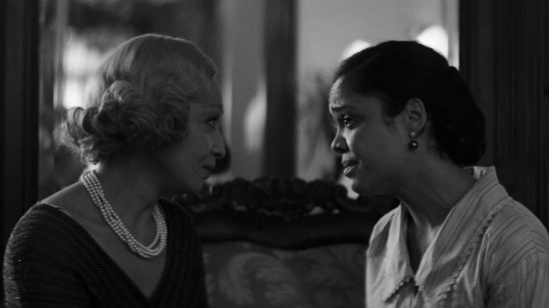 Irene (Tessa Thompson) and Clare (Ruth Negga) speak to each other in Passing