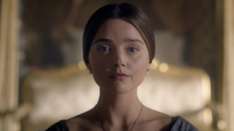 Queen Victoria (Jenna Coleman) looking forward in Victoria