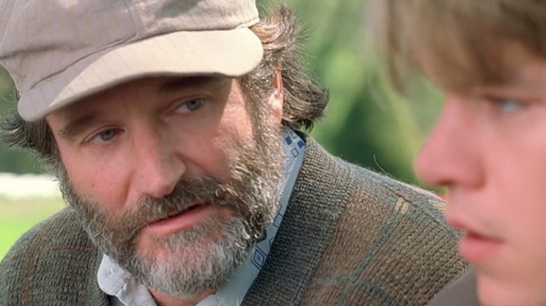 Sean Maguire (Robin Williams) speaks closely with Will Hunting (Matt Damon) in Good Will Hunting