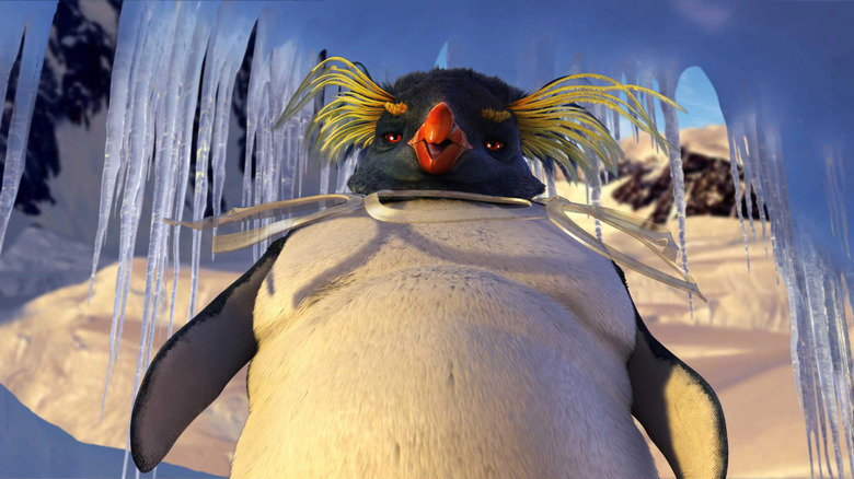 Lovelace (Robin Williams) stares down with plastic rings around his neck in Happy Feet