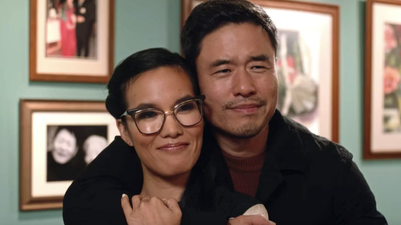 Ali Wong as Sasha Tran being hugged by Randall Park as Marcus Kim in Aways Be My Maybe