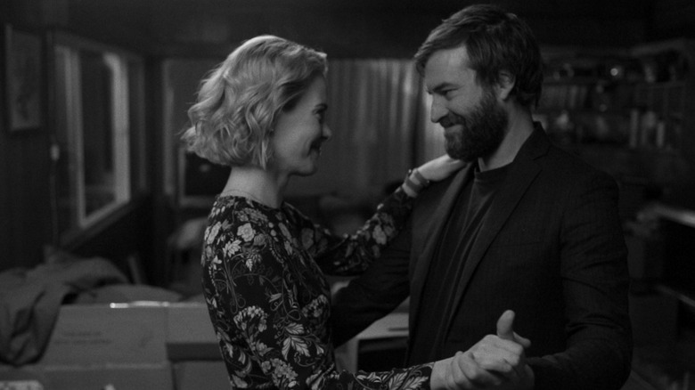 Sarah Paulson as Amanda and Mark Duplass as Jim Henderson dancing together in Blue Jay