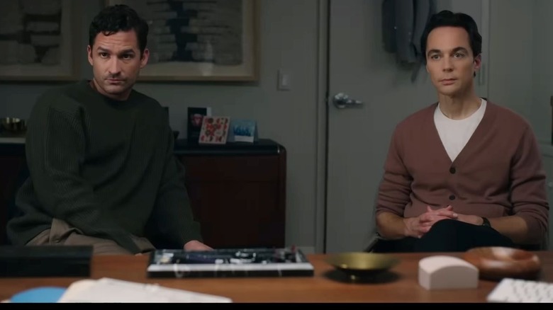 Ben Aldridge at Kit Cowan sits next to Jim Parsons as Michael Ausiello in an office in Spoiler Alert