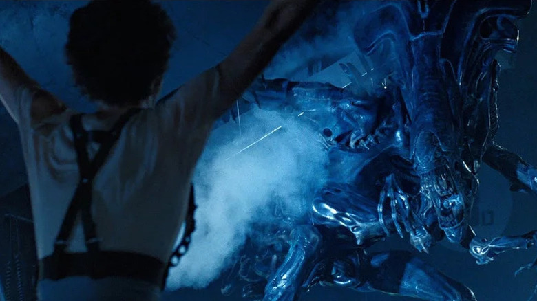 The Xenomorph Queen comes face to face with Sigourney Weaver as Ellen Ripley in Aliens
