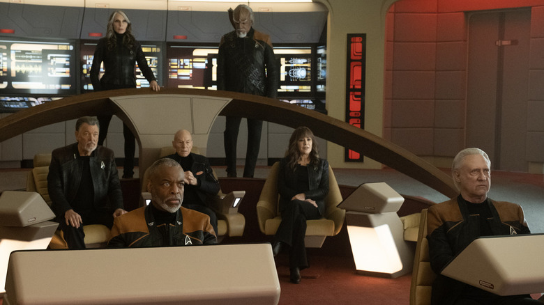 Gates McFadden as Dr. Beverly Crusher, Michael Dorn as Worf, Jonathan Frakes as William Riker, LeVar Burton as Geordi La Forge, Patrick Stewart as Captain Jean-Luc Picard, Marina Sirtis as Deanna Troi, and Brent Spiner as Data on the bridge of the Enterprise in Star Trek: Picard