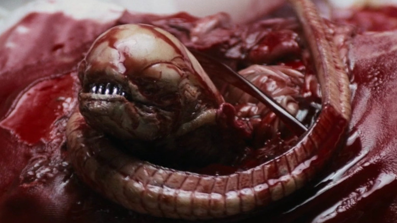 Chestburster emerging from Kane in Alien