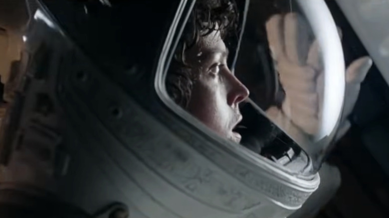 Ellen Ripley (Sigourney Weaver) looks out to space in Alien