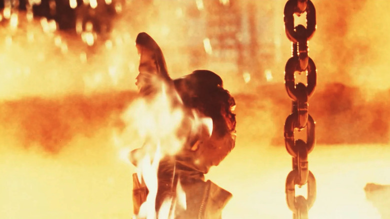 The T-800 (Arnold Schwarzenegger) gives a thumbs up as its lowered into molten metal in Terminator 2: Judgment Day