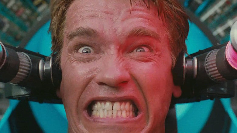 Doug Quaid (Arnold Schwarzenegger) endures a memory implant device in Total Recall