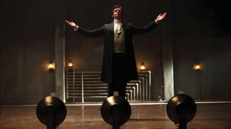 Hugh Jackman as Lord Caldlow, presenting a trick in The Prestige.